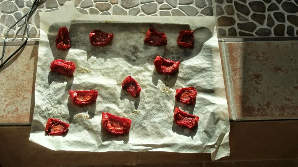 Sun-dried tomatoes drying on a tray in the Andalucían sun – The Flexible Chef