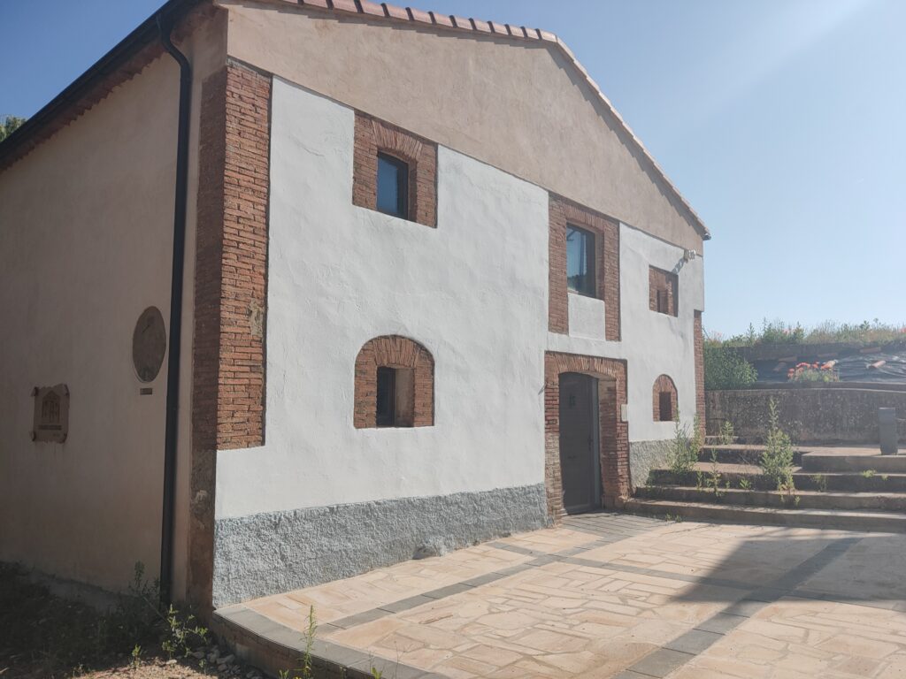 Restored toilet block with solar-powered hot showers at an Área de Autocaravanas in Soria, Spain