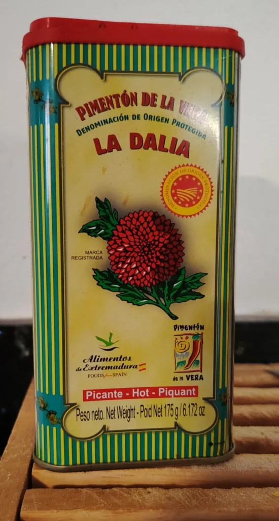 La Dalia Pimentón de la Vera picante tin — the smoked paprika used in this conejo al ajillo recipe