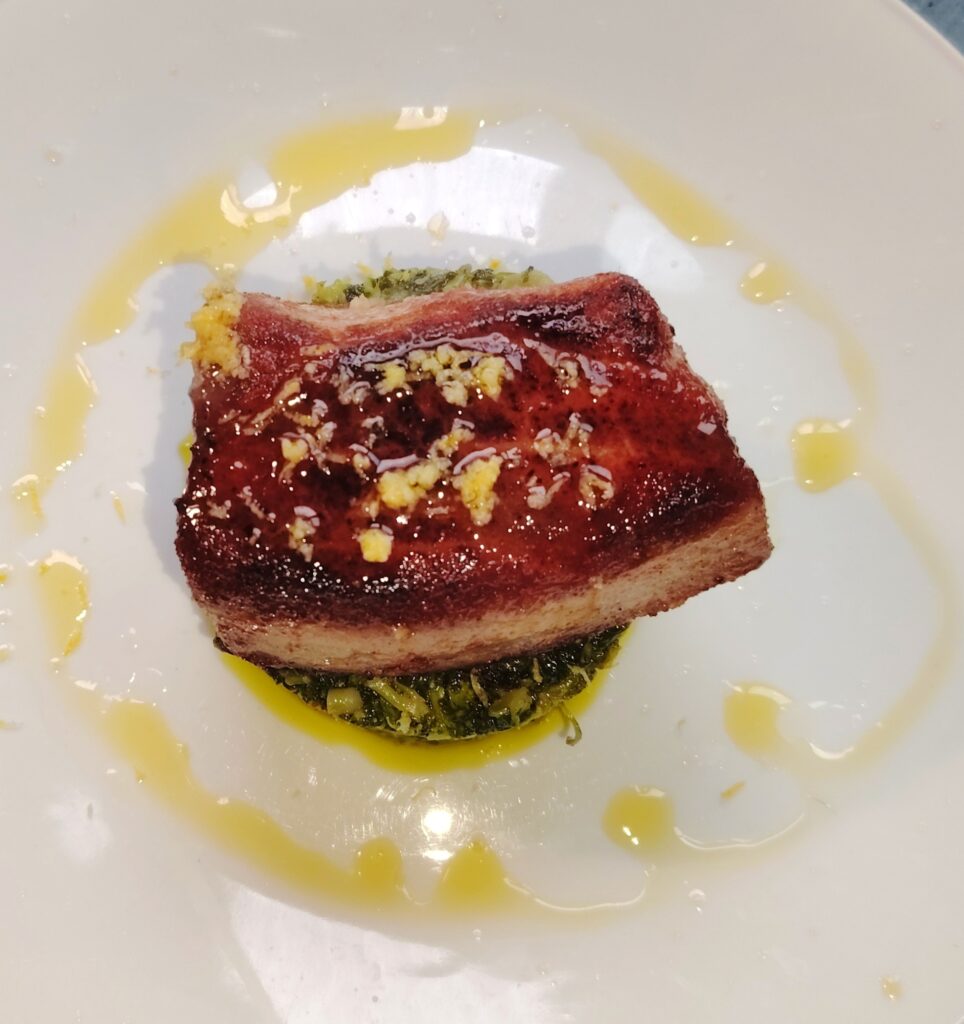 Pan-Seared Tuna Steak on a white plate