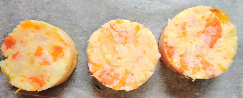 Homemade veggie patties with turnip, carrot and parmesan on baking parchment – Casa Adora