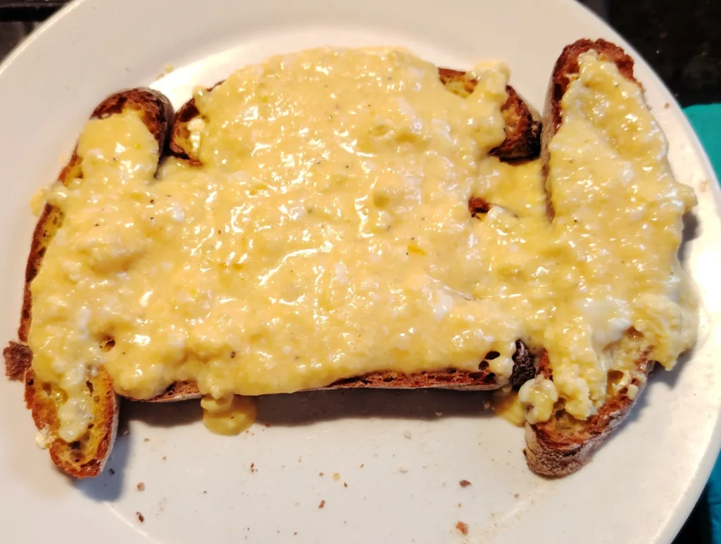 Hybrid Welsh rarebit — silky melted Cheddar and egg on toasted sourdough, Casa Adora