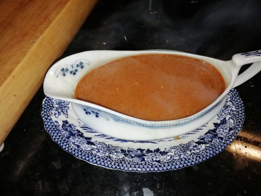 Full gravy boat of rich chicken stock for mushroom and pearl barley soup — mushroom and pearl barley soup — The Flexible Chef