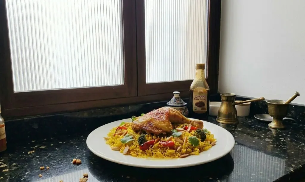 Fega'ata chicken recipe — golden saffron rice with spiced chicken, broccoli, red pepper and toasted almonds – Casa Adora