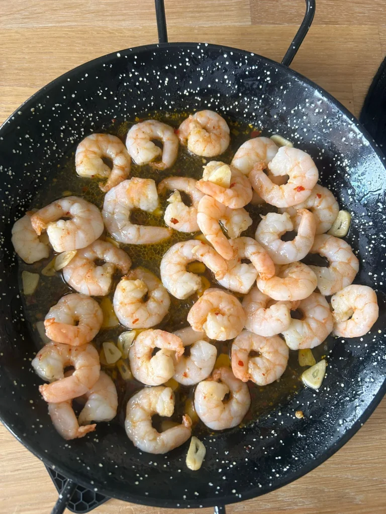Garlic prawns with chilli oil in a paella pan — Debbie's Bank Holiday starter, Rochdale